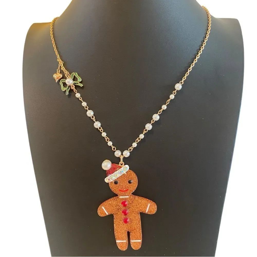 Adorable Betsey Johnson Sparkly Gingerbread Man Necklace.